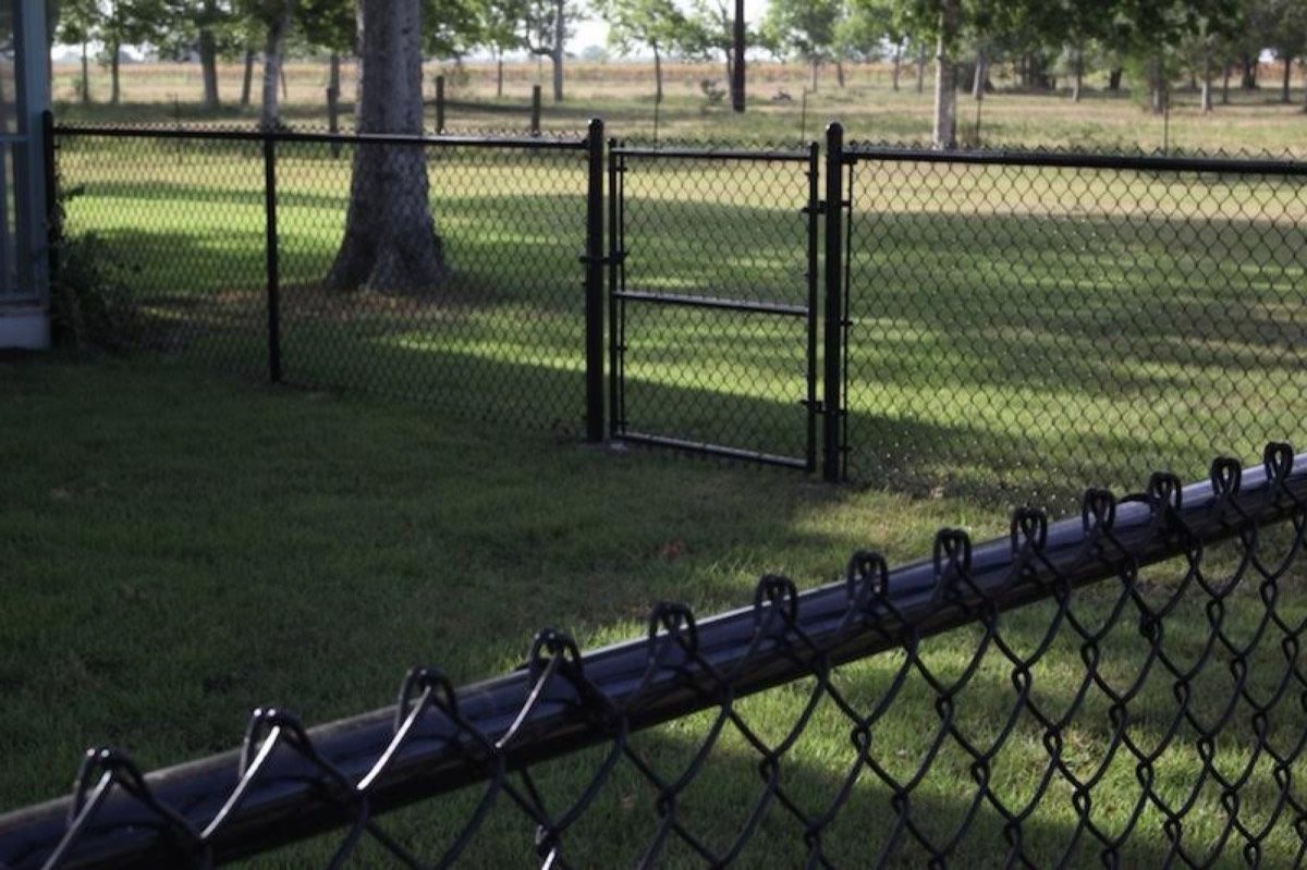 Black galvanized steel residential perimeter fence